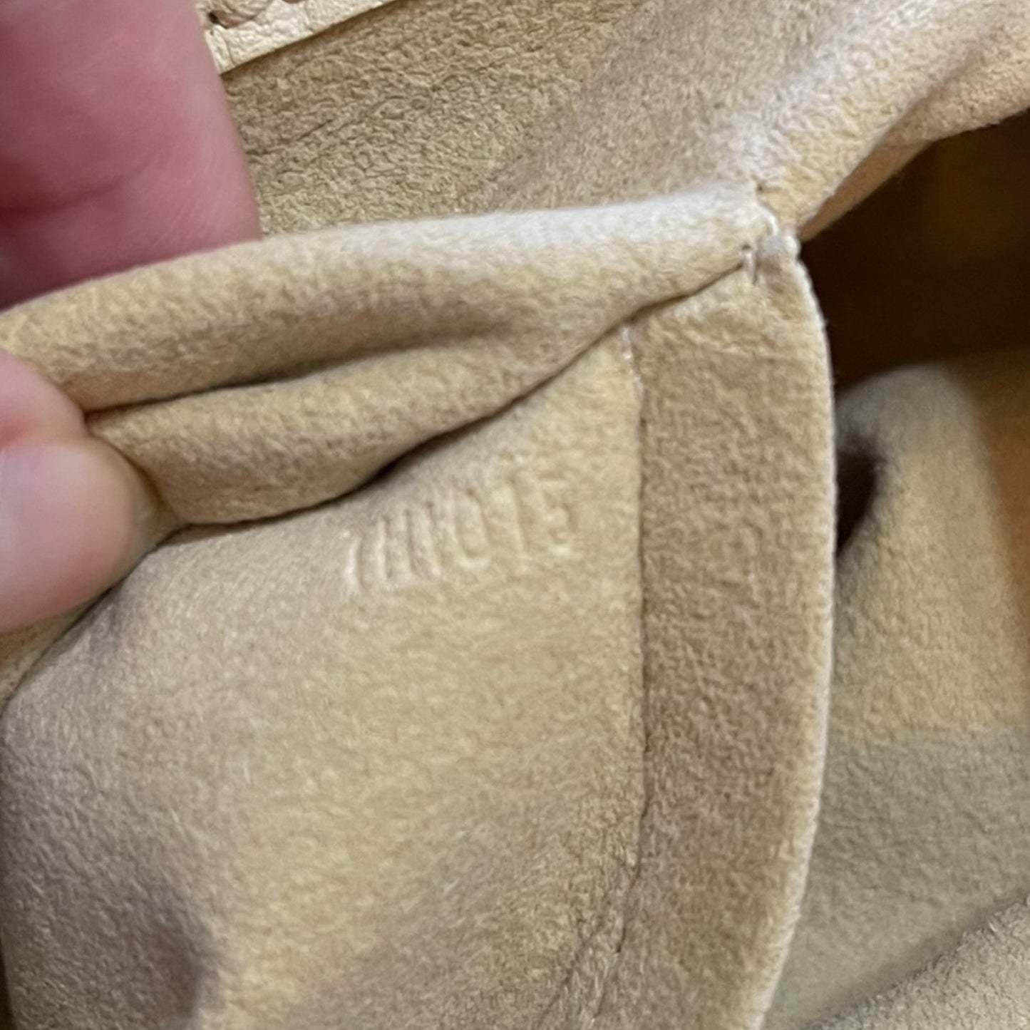 Interior date code on purse