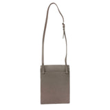 Back of purple crossbody bag on a white background