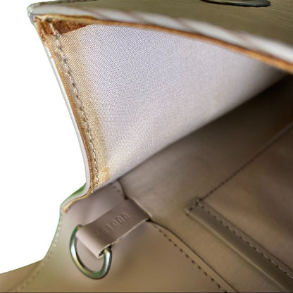 Interior of purse showing date code. 