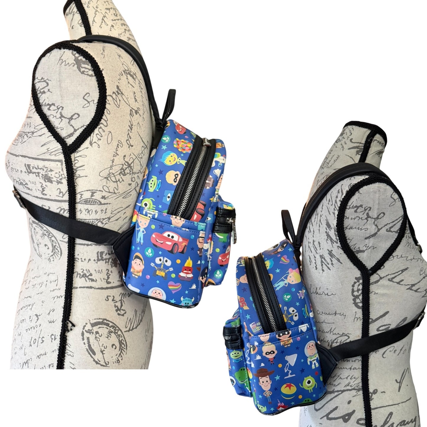 Side view of blue patterned bag on mannequin stands with a white background