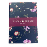 Floral-patterned product packaging with 'Lucky Brand' label on a white background