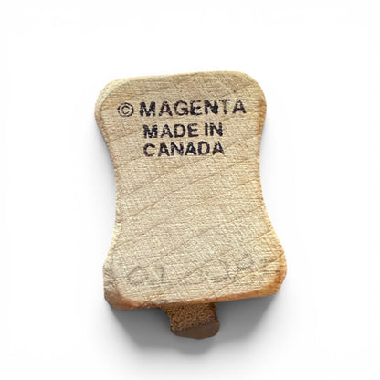 Wood block with 'Magenta Made in Canada' branding on a white background