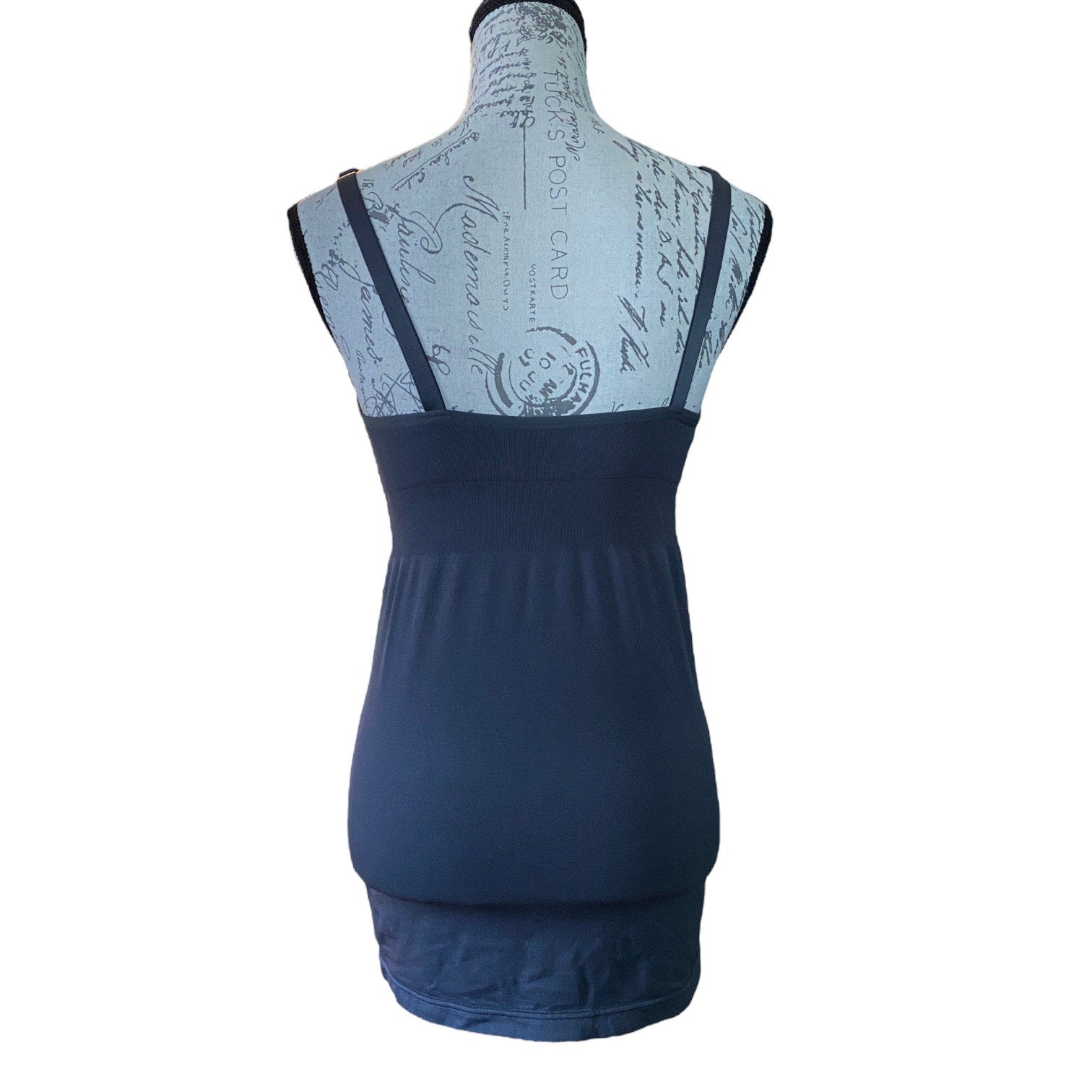 Back of gray tank top on a mannequin with a white background