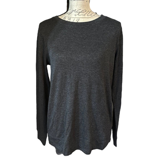 Front of Dark gray long-sleeve top on a mannequin against a white background