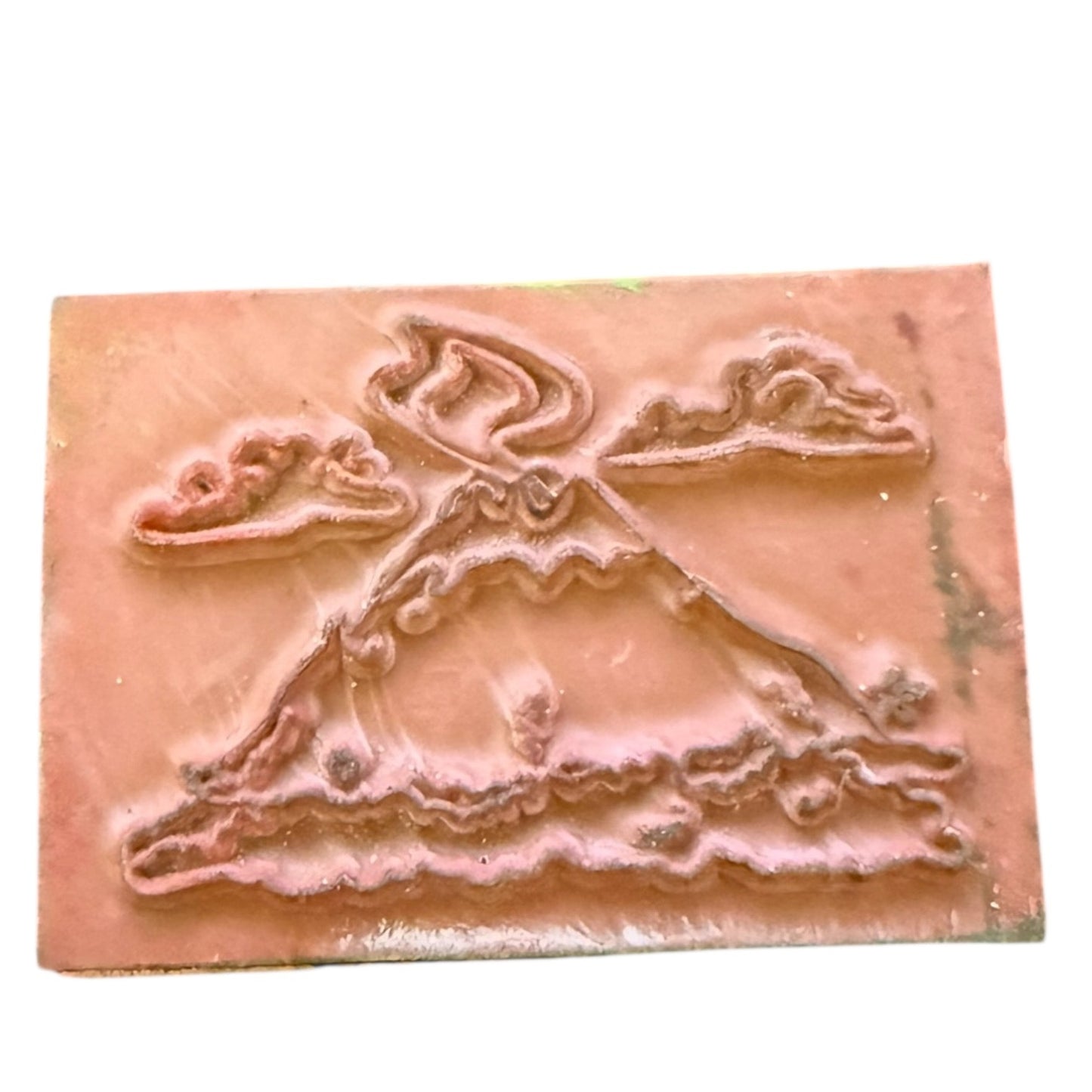 Volcano embossed design stamp on a white background