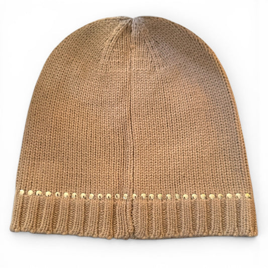 beige knit beanie with gold studs on a white background