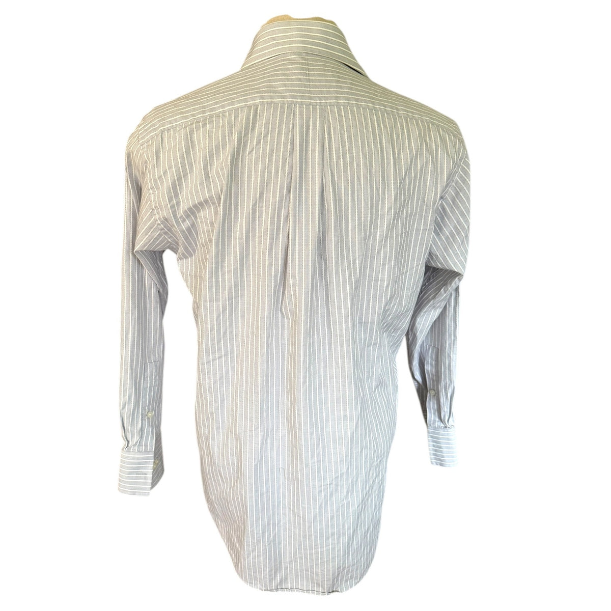 A long-sleeve button-down shirt with vertical pinstripes, shown from the back on a mannequin torso against a plain white background.