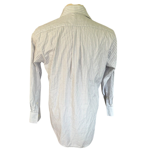 A long-sleeve button-down shirt with vertical pinstripes, shown from the back on a mannequin torso against a plain white background.