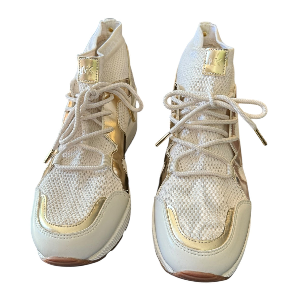 A pair of white and gold high-top sneakers shown from the front on a plain white background.