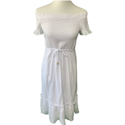 White off-shoulder dress on a mannequin against a white background
