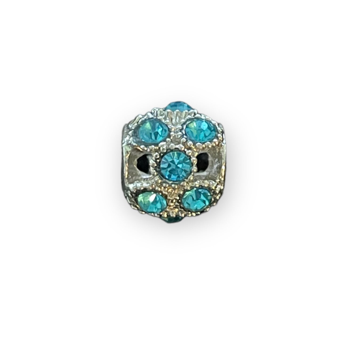 A single decorative bead charm with a silver-toned base set with faceted turquoise-blue rhinestones, shown on a plain white background.