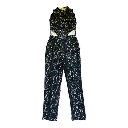 Black and white patterned jumpsuit against a white background