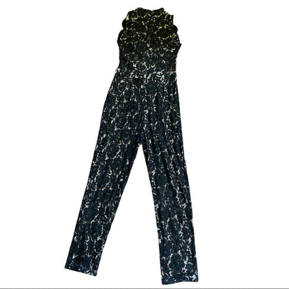 Back of Black and white patterned jumpsuit on a white background