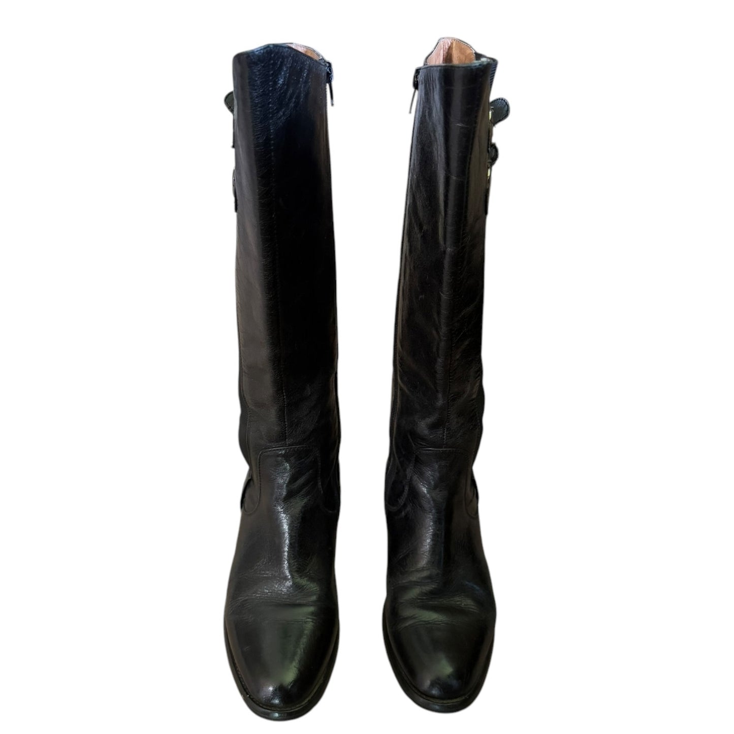 Front of a Pair of black knee-high boots on a white background