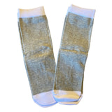 Pair of gray and white patterned socks on a white background