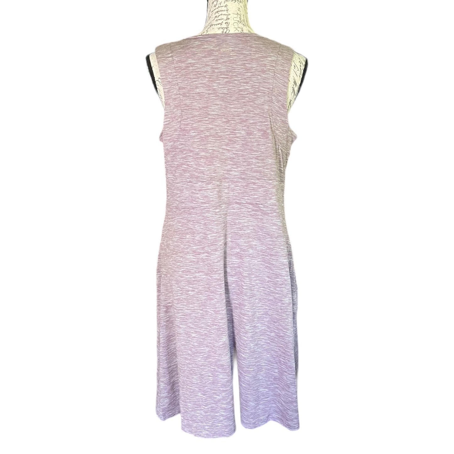 Sleeveless dress with a gradient pattern on a mannequin against a white background