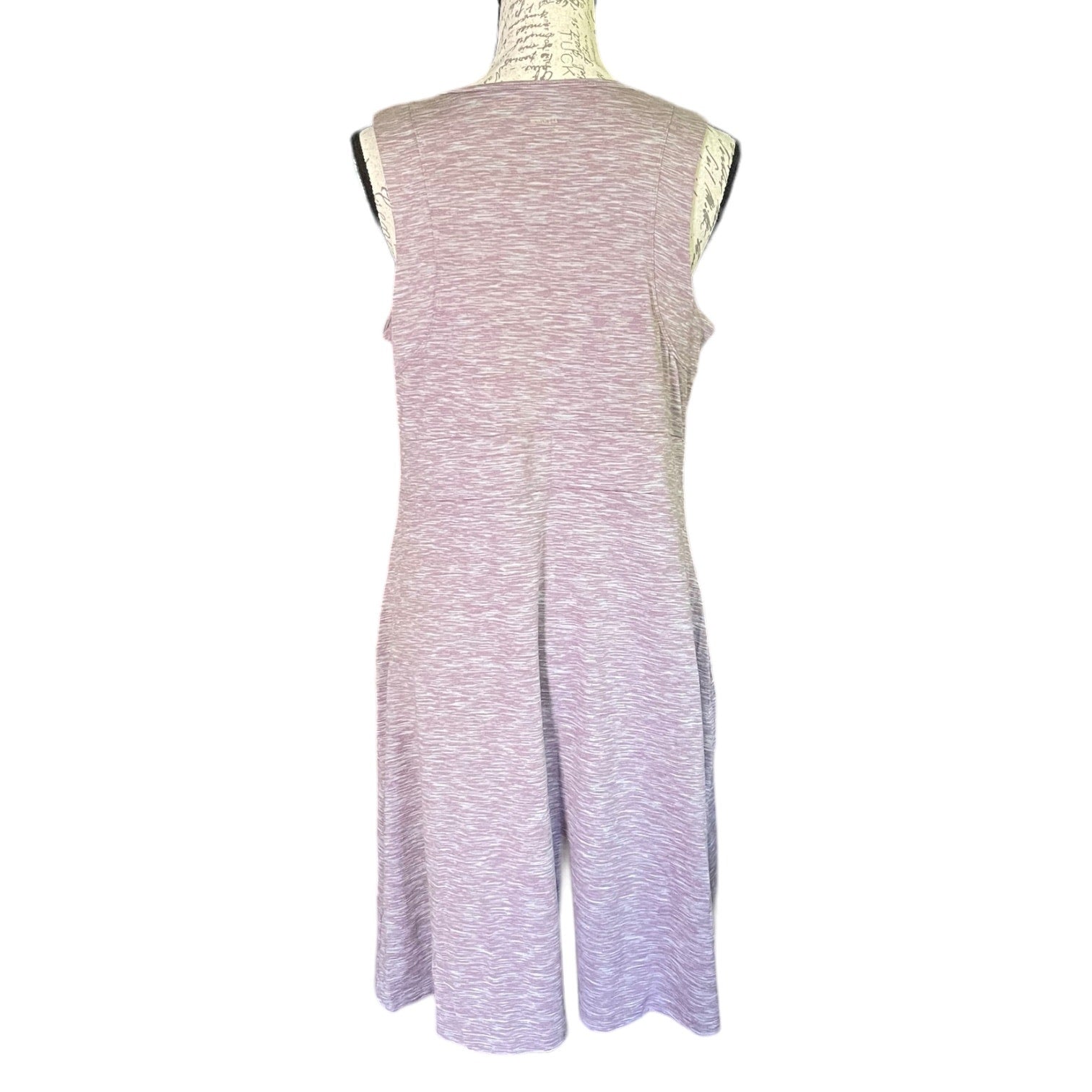 Sleeveless dress with a gradient pattern on a mannequin against a white background