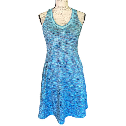 A sleeveless scoop-neck dress displayed on a mannequin torso. The dress features a textured, heathered pattern in shades of blue
