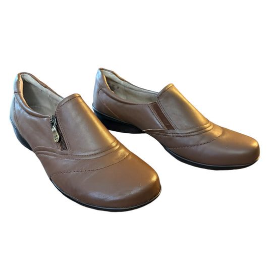 Front side Pair of brown leather shoes on a white background
