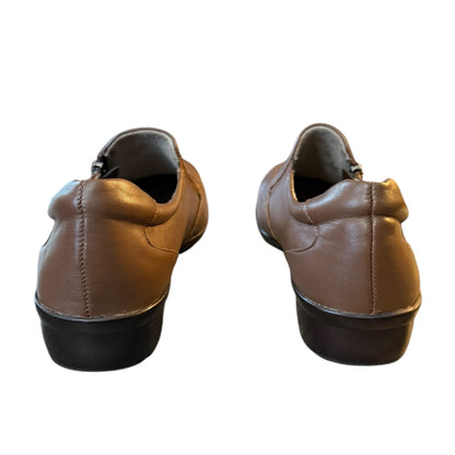 Pair of brown leather shoes  back on a white background