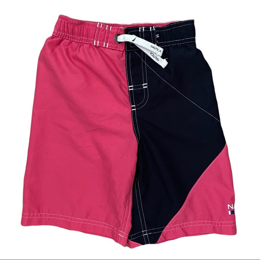 Pink and navy shorts with a visible brand tag on a white background