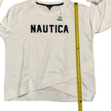 Nautica shirt with a measuring tape on a white background
