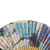 Fanned-out book titled 'Neon Genesis Evangelion' with character illustrations on a white background