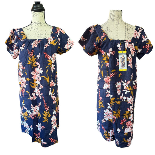 Navy floral dress on a mannequin with a white background