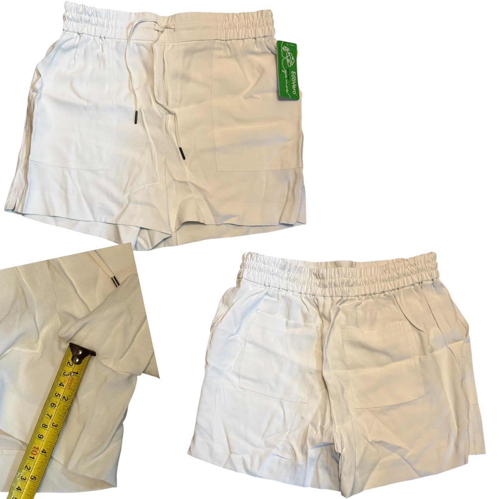 shorts with a green tag on a white background