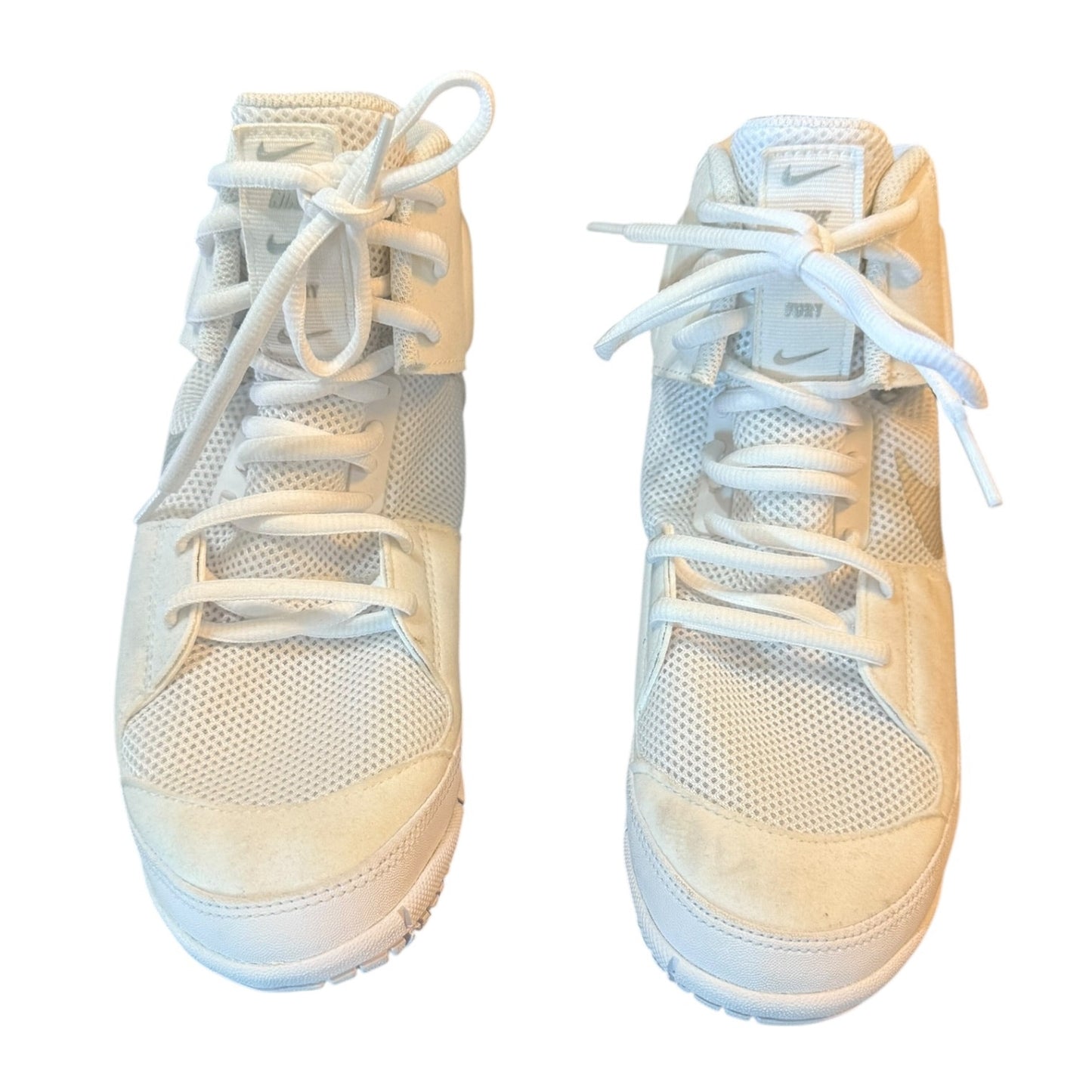 Pair of white high-top sneakers with white laces on a white background