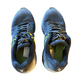 Top of black athletic shoes  on a white background