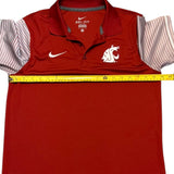 Red Nike Dri-FIT polo shirt with a measuring tape on a white background