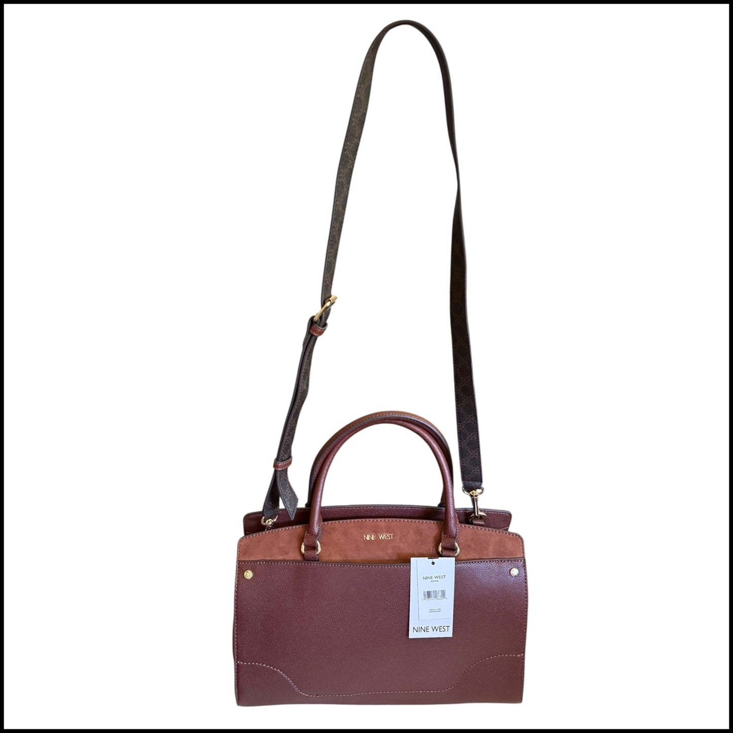 Brown handbag with a strap on a white background