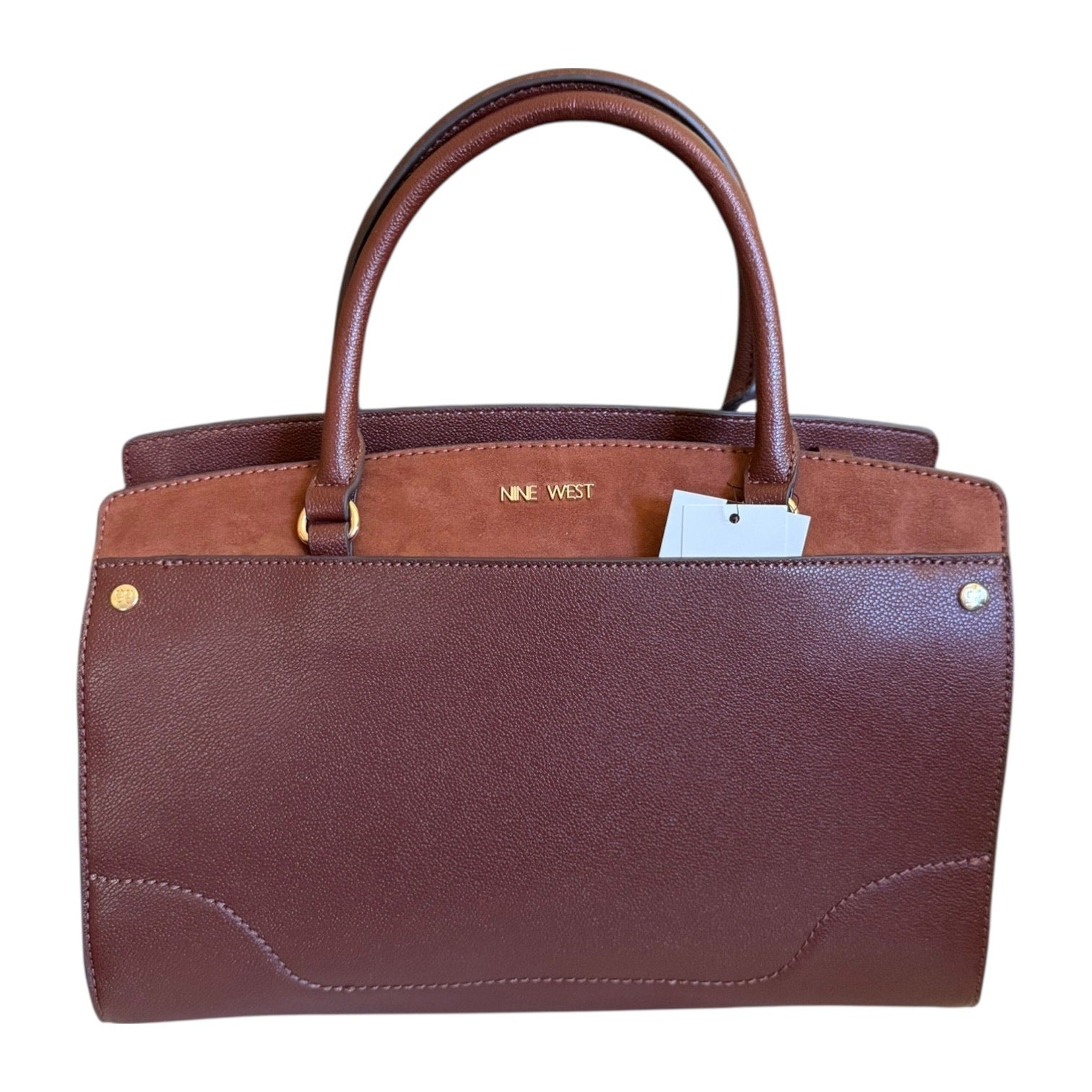 Front of Brown handbag with visible 'Nike West' branding on a white background