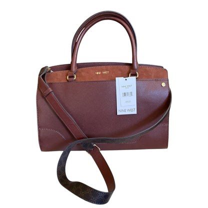 Front of Brown handbag with a visible Nine West tag on a white background