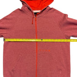 Pit to pit of red hoodie