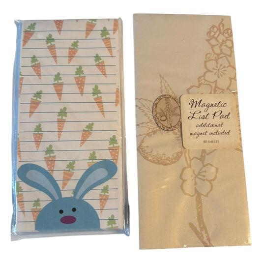 2 notepads. One with rabbits and carrots. One wth floral print. 