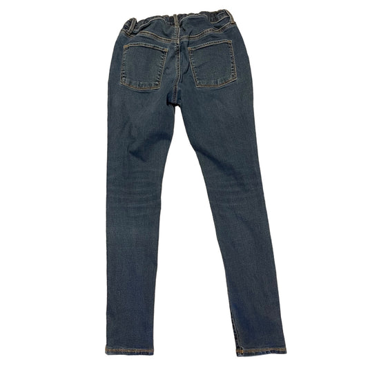 Back of a Pair of blue jeans on a white background