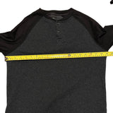 pit to pit of gray black shirt