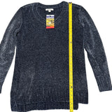 Navy sweater with a measuring tape on a white background
