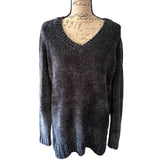 Dark navy front ribbed sweater on a mannequin with a white background
