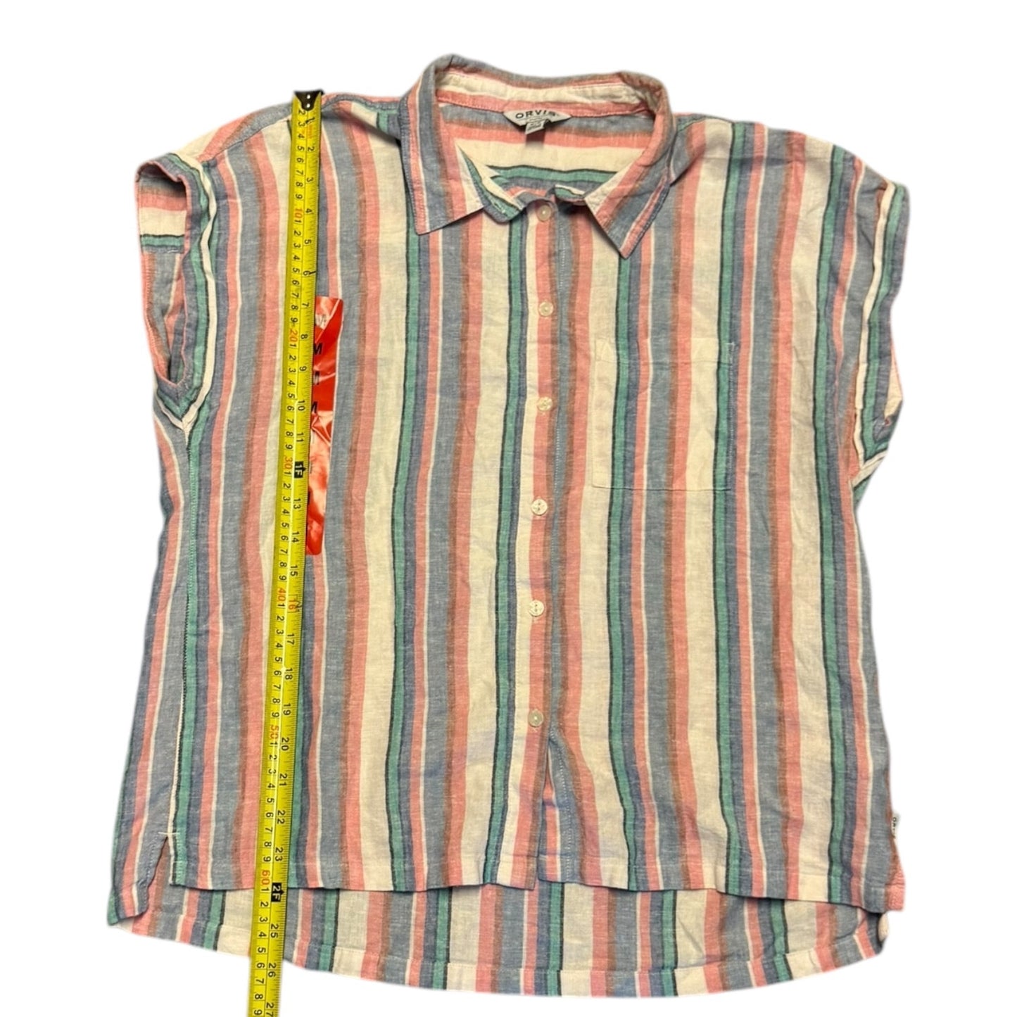 A striped short-sleeve button-up shirt laid flat on a white background, with a yellow measuring tape vertically positioned along the left side to indicate size. 