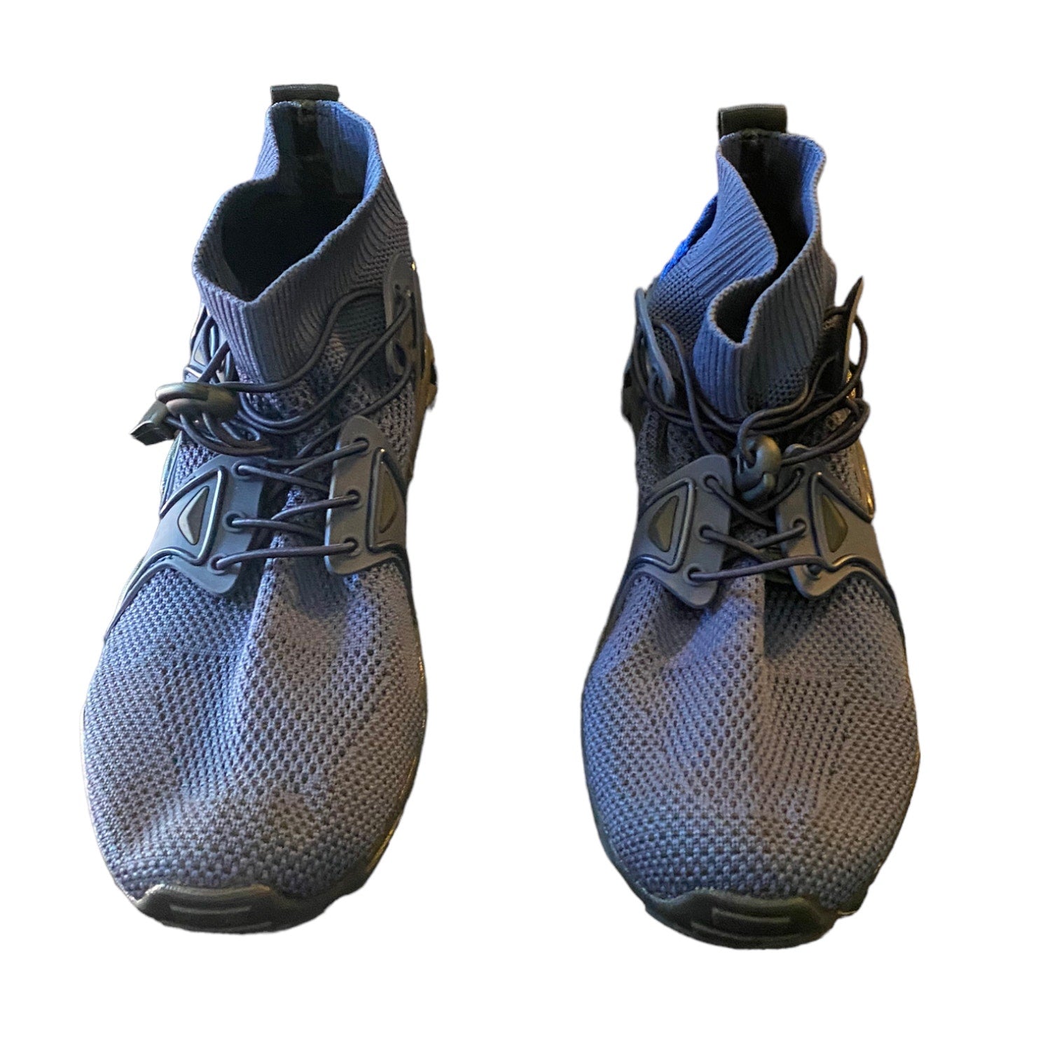 Front of Pair of blue athletic shoes on a white background