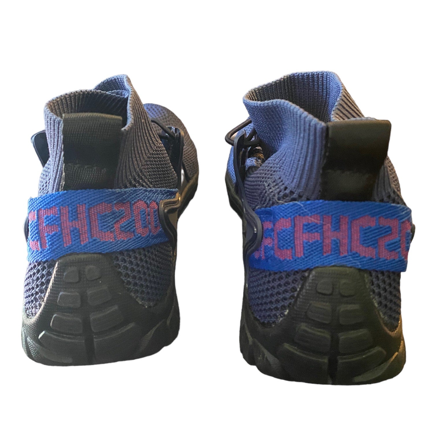 Back of Pair of black and blue shoes with 'CFHC20' branding on a white background