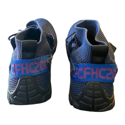 Back of Blue and black shoes with 'CFHC20' branding on a white background