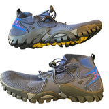 Side of blue athletic shoes with yellow sole on a white background