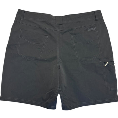 Back of gray shorts with a visible brand logo on a white background