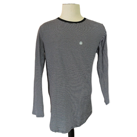 Black and white striped long-sleeve shirt on a mannequin against a white background