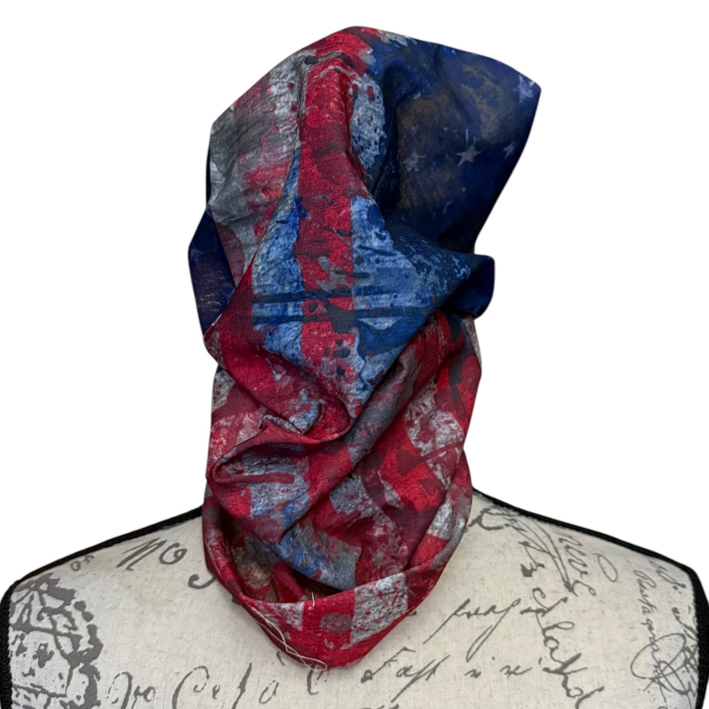 Colorful patterned balaclava on a mannequin with a white background