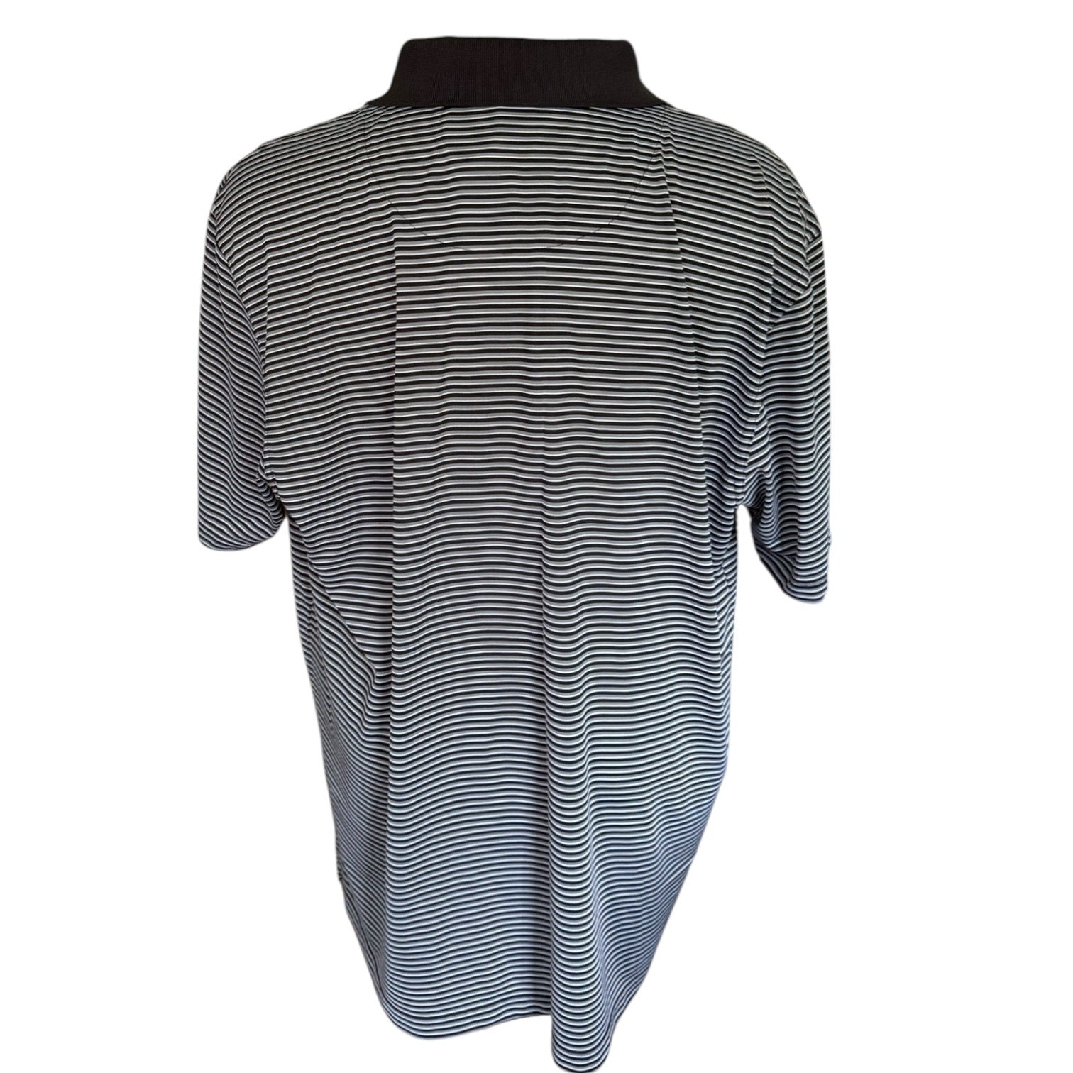 Black and white striped back of dress on a mannequin with a white background